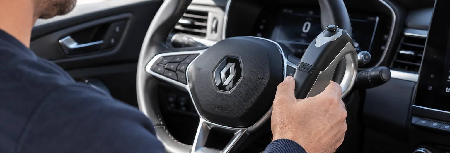 Télécommande au volant installé dans un vehicule